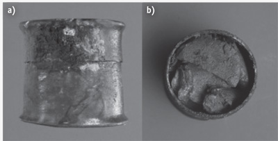 (a) A cylindrical tin container with a lid, known as a pyxis, was found by archaeologists among remnants of the ancient Relitto del Pozzino shipwreck that occurred 2,000 years ago off the coast of Tuscany in Italy, which contained (b) well-preserved medicine tablets.