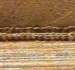 FIGURE 9. Seam welded between aluminum and titanium with no requirement for material favoring. FIGURE 9. Seam welded between aluminum and titanium with no requirement for material favoring.