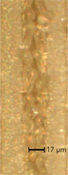 FIGURE 4. Top-view microscope picture showing clean quality laser scribe using 80 J/cm2 fluence at 200 kHz PRF.
