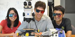 Cindy Wong, Adam Harrison, and Dileepan Joseph (left to right) model the red/cyan glasses used to view 3D images from their VLRM.