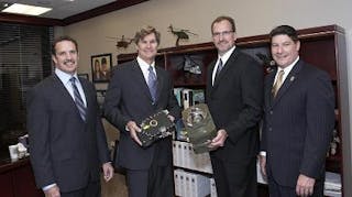 Dr. Timothy Day, chairman and CEO of Daylight Solutions, Paul Larson, president, COO, Daylight Solutions, Carl Smith, VP of infrared countermeasures for Northrop Grumman, and Jeffrey Palombo, VP and GM of Northrop Grumman&apos;s Land and Self Protection Systems Division, unveil the companies&apos; CIRCM laser and pointer-tracker offering.