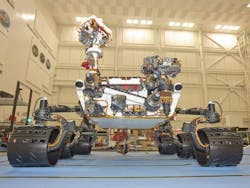 The MSL rover, Curiosity, is shown inside the Spacecraft Assembly Facility at the Jet Propulsion Laboratory (Pasadena, CA). The ChemCam is at the top of the mast just left of center. The MSL rover, Curiosity, is shown inside the Spacecraft Assembly Facility at the Jet Propulsion Laboratory (Pasadena, CA). The ChemCam is at the top of the mast just left of center.