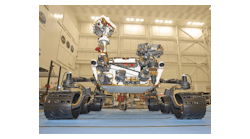 The MSL rover, Curiosity, is shown inside the Spacecraft Assembly Facility at the Jet Propulsion Laboratory (Pasadena, CA). The ChemCam is at the top of the mast just left of center.