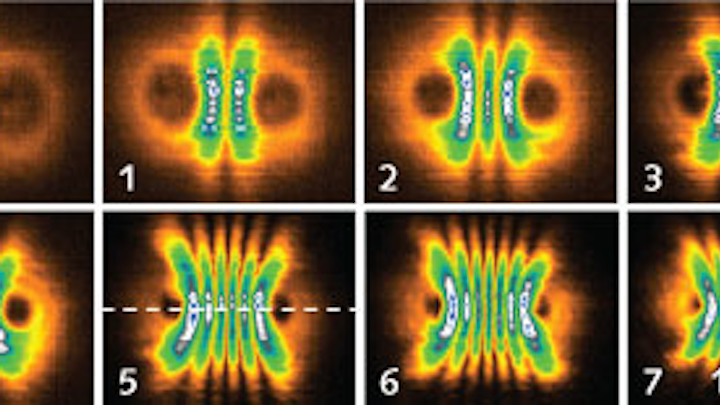 Interfering polariton condensates induced from two pump laser beams produce oscillating quantum states of laser light