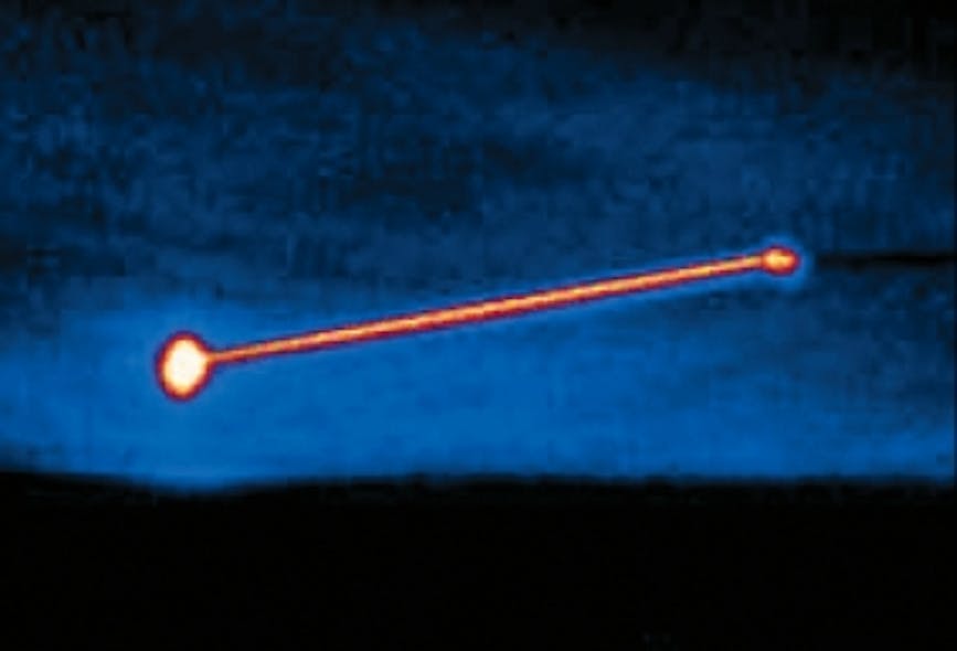 An infrared image shows the Airborne Laser firing at a SCUD missile an unspecified distance away, successfully shooting the missile down.