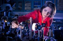 UCSD postdoctoral researcher Mercedeh Khajavikhan is at work in the optics laboratory.