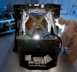 Technician inspects the James Webb Space Telescope Aft Optics Subsystem Technician inspects the James Webb Space Telescope Aft Optics Subsystem