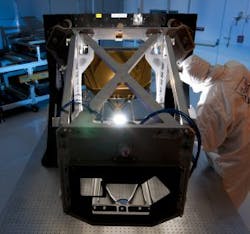 Technician inspects the James Webb Space Telescope Aft Optics Subsystem