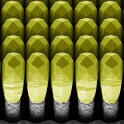 Perspective scanning electron micrograph of a dense array of three-dimensional germanium crystals. Perspective scanning electron micrograph of a dense array of three-dimensional germanium crystals.