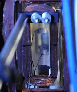 JILA's superradiant laser traps about a million rubidium dipoles in a space of about 2 cm between two mirrors. The atoms synchronize their internal oscillations to emit laser light.