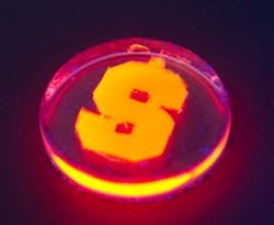 Quantum nanorods created with luciferase glow orange.