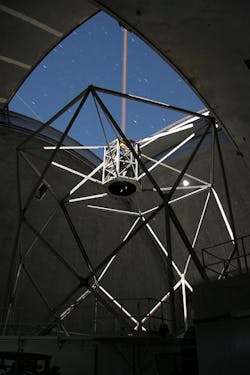 Like the Keck I Telescope's laser, shown here, the Keck II Toptica laser will launch from behind the telescope's secondary mirror. The laser will be more powerful as well as non-pulsing, which allows it to create a brighter guide star. The guide star is used to measure starlight-bending turbulence in Earth's atmosphere that is then canceled out with a deformable mirror in the adaptive optics system Like the Keck I Telescope's laser, shown here, the Keck II Toptica laser will launch from behind the telescope's secondary mirror. The laser will be more powerful as well as non-pulsing, which allows it to create a brighter guide star. The guide star is used to measure starlight-bending turbulence in Earth's atmosphere that is then canceled out with a deformable mirror in the adaptive optics system