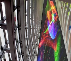 Interactive three-color laser display will fill 24 stories in a hotel atrium this fall Interactive three-color laser display will fill 24 stories in a hotel atrium this fall