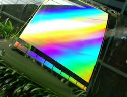 A nanoimprinted plastic film has patterned arrays of nanostructures imprinted on its surface. A nanoimprinted plastic film has patterned arrays of nanostructures imprinted on its surface.