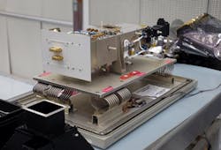 The Lyman Alpha Mapping Project (LAMP) spectrometer aboard the LRO (shown here in a pre-flight photo) uses a novel method to peer into the perpetual darkness of the moon's so-called permanently shadowed regions and 'see' the lunar surface using the ultraviolet light from nearby space and stars. (Courtesy NASA Goddard/Debbie McCallum) The Lyman Alpha Mapping Project (LAMP) spectrometer aboard the LRO (shown here in a pre-flight photo) uses a novel method to peer into the perpetual darkness of the moon's so-called permanently shadowed regions and 'see' the lunar surface using the ultraviolet light from nearby space and stars. (Courtesy NASA Goddard/Debbie McCallum)