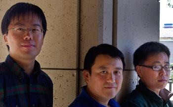 Shanhui Fan (center) and post-doctoral scholar Zongfu Yu (right), both of the Stanford school of engineering, and doctoral candidate Kejie Fang (left), of the department of physics, have used 'synthetic magnetism' to control the flow of light at the nanoscale.