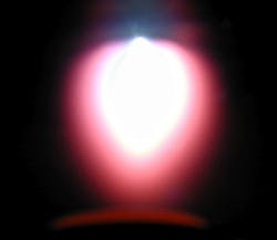 Using a high-power pulsed laser to deposit materials from a plasma plume (shown here), researchers synthesized pyroelectric thin films to study their properties at the nanoscale.