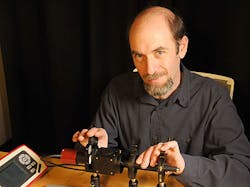 NIST laser safety officer Joshua Hadler and his apparatus for measuring the properties of handheld laser devices. NIST laser safety officer Joshua Hadler and his apparatus for measuring the properties of handheld laser devices.