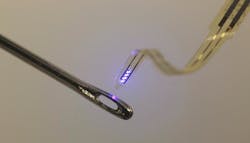 A thin plastic ribbon printed with advanced electronics is threaded through the eye of an ordinary sewing needle. The device, containing LEDs, electrodes and sensors, can be injected into the brain or other organs.