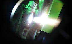 A burst of laser energy 50 times greater than the worldwide output of electrical power slams into an extremely thin foil target to produce neutrons at Los Alamos National Laboratory's TRIDENT laser facility during a recent experiment, proving that laser-driven neutrons can be used to detect and interdict smuggled nuclear materials. A burst of laser energy 50 times greater than the worldwide output of electrical power slams into an extremely thin foil target to produce neutrons at Los Alamos National Laboratory's TRIDENT laser facility during a recent experiment, proving that laser-driven neutrons can be used to detect and interdict smuggled nuclear materials.