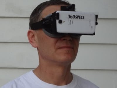 Ray Latypov, CEO of VirtuSphere, demonstrates the 360specs, which hold a smartphone to form a virtual-reality headset. The smartphone&apos;s position sensors, along with an app, ensure that the view turns as the viewer turns.
