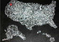Strengthened Gorilla glass cut into 1 mm cubes using FiLaser's patented glass process is arranged in the shape of the US, with FiLaser's headquarters in Portland, OR indicated in red. Strengthened Gorilla glass cut into 1 mm cubes using FiLaser's patented glass process is arranged in the shape of the US, with FiLaser's headquarters in Portland, OR indicated in red.