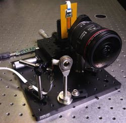 A fiber-coupled monocentric lens camera (left) sits next to a much larger Canon EOS 5D Mark III DSLR, used for conventional wide-angle imaging. A fiber-coupled monocentric lens camera (left) sits next to a much larger Canon EOS 5D Mark III DSLR, used for conventional wide-angle imaging.