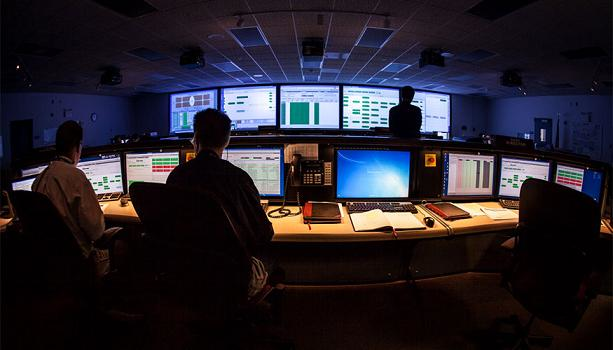 All NIF experiments are controlled and orchestrated by the integrated computer control system in the facility's control room, which consists of 950 front-end processors attached to about 60,000 control points, including mirrors, lenses, motors, sensors, cameras, amplifiers, capacitors and diagnostic instruments.