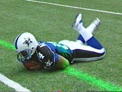 First Down Laser Systems want to take the first-down line from the TV to the actual field of play. First Down Laser Systems want to take the first-down line from the TV to the actual field of play.