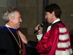 President Dean Lewis of the University of Bordeaux vests Professor Martin Richardson of the University of Central Florida with the insignia of a &apos;Docteur Honoris Causa&apos; of the University of Bordeaux. (Image credit: University of Central Florida)