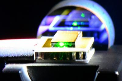 Diamond Raman laser converts 1064 nm to 1485 nm light with a conversion efficiency of 40% and a 2.7X improvement in beam quality, resulting in a net beam brightness increase of 50%.