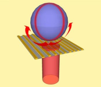 A gold grating at the end of an optical fiber couples light into a spherical microcavity, shown here as a purple sphere. The red arrows show the light bent by the grating, which is then coupled to the whispering-gallery mode (red circle). Concentrating light in compact structures is important for advancing photonics.