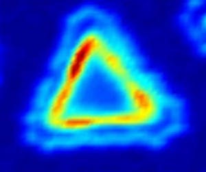 A photoluminescence intensity map shows a microscopic top view of a typical lateral heterostructure. The junction region produces enhanced light emission, showing its application potential in photonics.