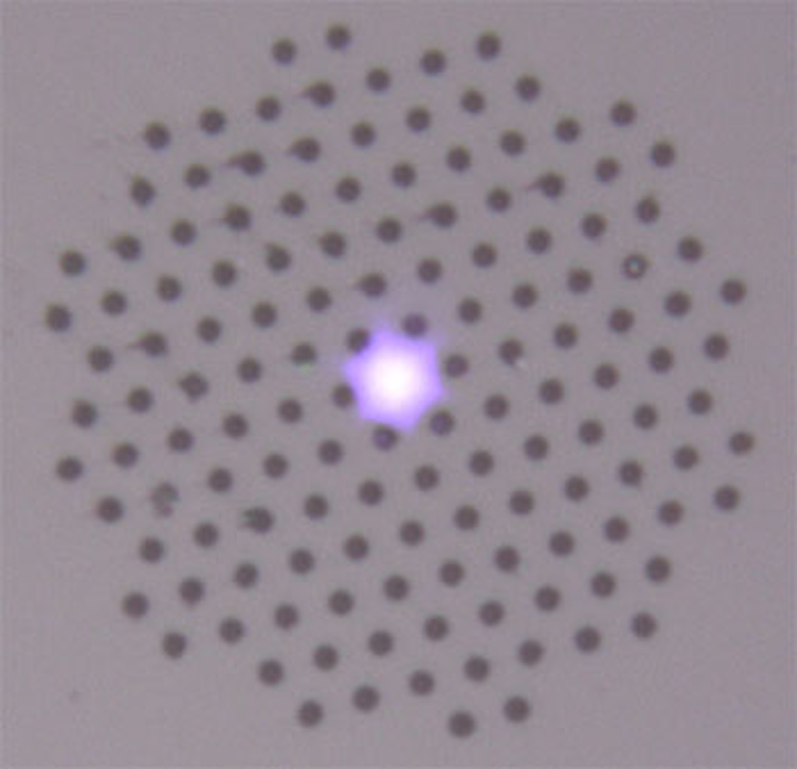Optical fibers infused with hydrogen transmit UV light without solarization damage
