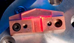 A heterocomposite Nd:YVO4/SiC thin-disk element amplified seed-laser power to 1 to 55 W with a gain of 4 to 2.6, respectively. A heterocomposite Nd:YVO4/SiC thin-disk element amplified seed-laser power to 1 to 55 W with a gain of 4 to 2.6, respectively.