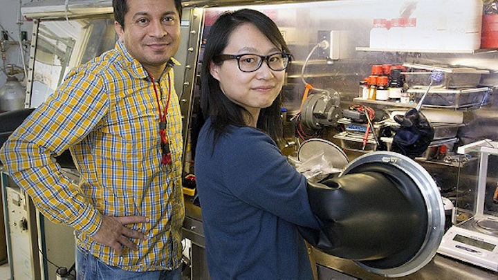 Scientists Aditya Mohite, left, and Wanyi Nie are perfecting a crystal production technique to improve perovskite crystal production for solar cells at Los Alamos National Laboratory. (Image credit: LANL)