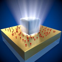 A nanoscale view of the new superfast fluorescent system using a transmission electron microscope (thumbnail image shows an artistic illustration of the system). The silver cube is just 75 nm wide. The quantum dots (red) are sandwiched between the silver cube and a thin gold foil. A nanoscale view of the new superfast fluorescent system using a transmission electron microscope (thumbnail image shows an artistic illustration of the system). The silver cube is just 75 nm wide. The quantum dots (red) are sandwiched between the silver cube and a thin gold foil.