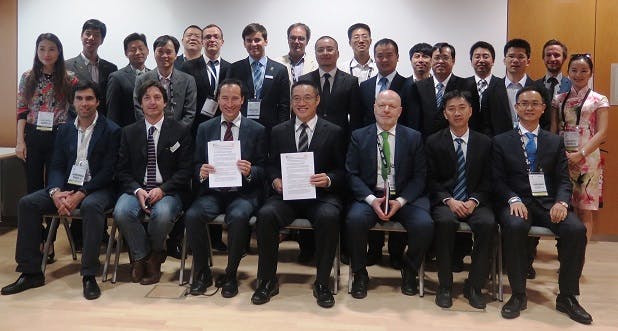 Carlos Lee, director general of the European Photonics Industry Consortium (EPIC) and Hou Ruohong, president of the Guangdong Laser Industry Association (GDLIA) sign a collaboration agreement at LASER World of PHOTONICS on 23 June 2015 in Munich, Germany.