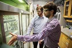 A new, first-of-its-kind technique developed by Bobby Day (left) and Max Mankin, graduate students working in the lab of Charles Lieber, the Mark Hyman Jr. Professor of Chemistry at Harvard University, could have applications in areas ranging from consumer electronics to solar panels.