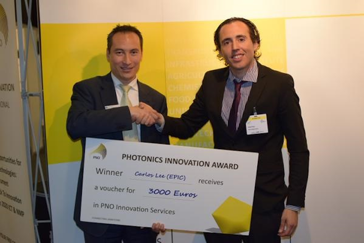 EPIC director general Carlos Lee receives the first PNO Photonics Innovation Award. (Image credit: PNO Consultants)