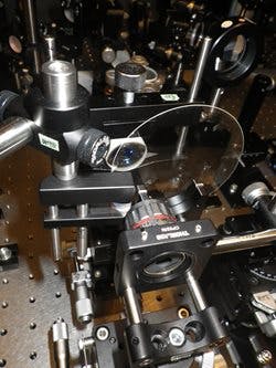 Researchers from Japan have developed a new high-speed camera technology called STAMP that can record events at a rate of more than 1-trillion-frames-per-second. The prototype camera is shown here in the lab.