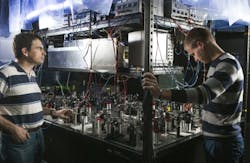Professor Alex Lvovsky (left) and PhD student Alexander Ulanov (right) are pictured with their quantum-entanglement setup. Professor Alex Lvovsky (left) and PhD student Alexander Ulanov (right) are pictured with their quantum-entanglement setup.