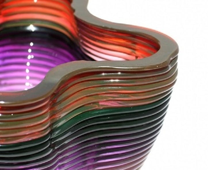 The ability to introduce variations in color into the stream of molten glass is one of the unusual properties of the new 3D glass printing system from MIT.