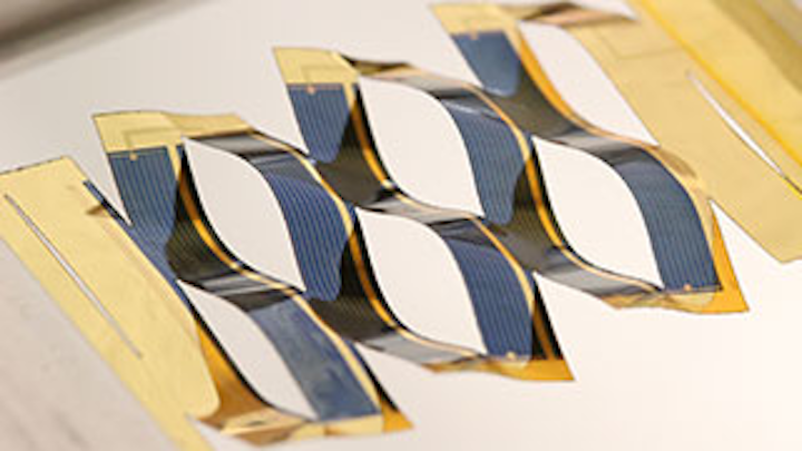 Stretched kirigami-patterned thin-film solar cells track the sun