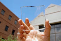 A 2 &times; 2 &times; 0.1 cm piece of polymer doped with a colorless blend of cyanine and cyanine salt serves as a luminescent solar concentrator (LSC) that absorbs near-IR light and re-emits it at a slightly longer wavelength; most of that light is channeled via total internal reflection to the edges of the plate, where the energy can be harvested by photovoltaic cells.