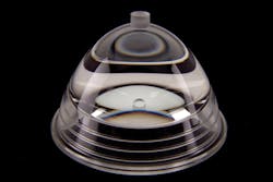 FIGURE 4. Complex optical designs previously limited to glass optics are now possible in plastic, including this lens, which has multiple optical surfaces with various mounting features. FIGURE 4. Complex optical designs previously limited to glass optics are now possible in plastic, including this lens, which has multiple optical surfaces with various mounting features.