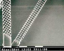 Ultraviolet (excimer) lasers are used to simultaneously drill holes in human hair by means of the mask technique. Ultraviolet (excimer) lasers are used to simultaneously drill holes in human hair by means of the mask technique.