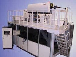 FIGURE 2. Rofin’s remote laser welding system is designed as a gantry type unit, carrying a laser resonator on the top of the gantry and the scanning unit underneath. FIGURE 2. Rofin’s remote laser welding system is designed as a gantry type unit, carrying a laser resonator on the top of the gantry and the scanning unit underneath.