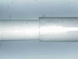 FIGURE 1. 266nm cutting of bio-absorbable material on ceramic mandrel. FIGURE 1. 266nm cutting of bio-absorbable material on ceramic mandrel.