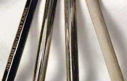 FIGURE 4. The injection-molded writing pen on the left yields high-contrast gold-on-black chroma, the middle two parts show poor chroma dispersion distribution, and the far-right fully scanned pen shows excellent dispersion performance. FIGURE 4. The injection-molded writing pen on the left yields high-contrast gold-on-black chroma, the middle two parts show poor chroma dispersion distribution, and the far-right fully scanned pen shows excellent dispersion performance.